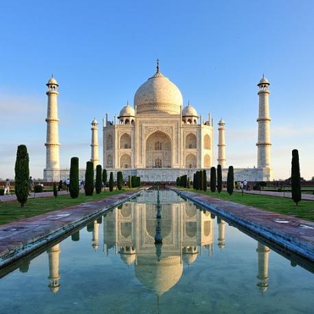 Taj Mahal, Agra, Uttar Pradesh, India: The Taj Mahal is a monument of love, and a symbol for India. The Taj Mahal is located on the right bank of the Yamuna River in a vast Mughal garden (Char Bagh). The immense mausoleum, covered with white marble, was built in Agra between 1631 and 1648 on decree of Mughal Emperor Shah Jahan, by a workforce of more than twenty thousand, in memory of his beloved wife Arjumand Banu Begum, her nickname: Mumtaz Mahal. The 