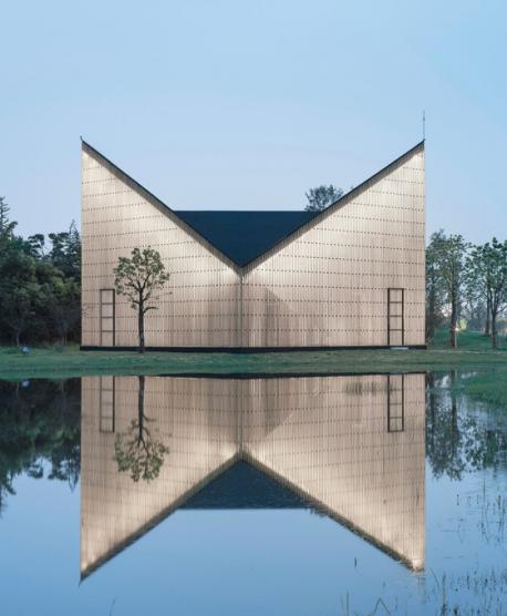 The Nanjing Wanjing Garden Chapel, located in AZL, Nanjing, China, was built in 2014. It has a simple, beautiful design that gets completed contemplating its reflection in the water. Are there any chapels in your area that complete their design with the beautiful effects that nature has to offer, like the water reflection in this case?