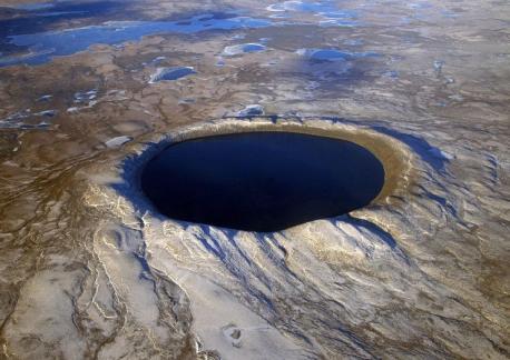 A gigantic crater filled with stunning clear blue water lies in the center of the Ungave plateau in Nunavik, the Park National des Pingualuit. According to Nunavik Parks, the Inuit call this magnificent crater pingualuit, which means 