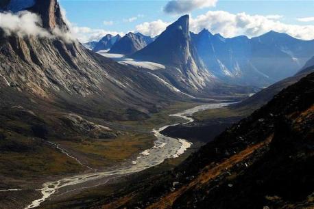 Auyuittuq National Park features a stunning landscape that is 85 percent rock and ice and dominated by steep and rugged mountains, vast glaciers, and rivers. What stands out about this beautiful part of Canada is Mount Thor, the peak of this grand mountain which is an astounding 5,495 feet, making it the earth's greatest vertical drop of 1250 meters, with a slightly overhanging rock face that averages about 15 degrees. Early European travelers who were inspired by Odin, Thor, Loki, Balder, Fridd, and Breidablik gave the name of this peak and others. Have you ever been to this area of Nunavut?