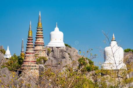 Thailand's Floating Pagodas sit on mountaintops in a non-hunting area of Lampang. Wat Chaloem Phra Kiat Phrachomklao Rachanusorn or generally known as the Floating Pagodas were built upon faith of the locals and Buddhist monks in the area taking 10 years to finish in the early 2000s. These pagodas dotting the mountain peaks were each carried up piece by piece by a revered local monk and a team of nearly 50 workers. Do you find the Floating Pagodas to be visually stunning?