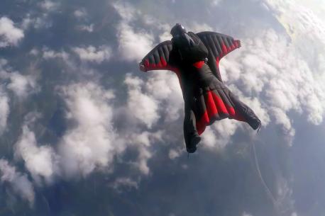 To practice wingsuit flying, two basic elements are essential: a wingsuit and a parachute. The wingsuit's purpose is to convert the vertical fall into a horizontal flight motion, while the parachute ensures a safe landing. Various designs exist, but all follow a set of principles. The suit is made of nylon (or another durable material) and has three wings: two between the arms and torso, and one between the legs. Have you or do you personally know someone who has wingsuited before?