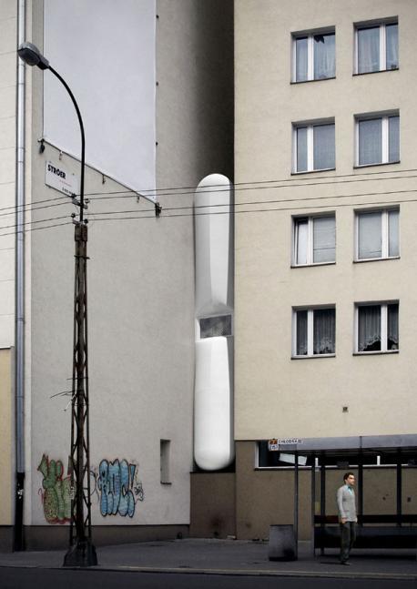 Poland - Keret House - The world's slimmest house inserted between two existing buildings, measures only from 92 to 152 centimeters in width! The iron structure contains two floors, and has one bedroom, a kitchen, a bathroom and a living area. It has two non-opening windows, with sunlight also entering through translucent glass panels that make up the walls. The entire interior is painted white and the building's electricity is obtained from a neighboring building. Would this house make you feel claustrophobic?