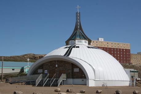 Nunavut - This giant, igloo-shaped dome and point steeple was originally built in 1972, and attracted church goers and looky-loos alike. Designed by Ronald Thom and built entirely by volunteers, St. Jude's inside was more stunning than the outside, with a baptismal carved out of soapstone, ornate wall hangings, many examples of Inuit craftsmanship, and a cross made out of the tusks of the majestic narwhal. Apparently not everyone was a fan of the igloo church and the building was destroyed in 2005 by an arsonist. Demolished a year later, it took until 2012 to raise the $6 million required to resurrect this place of worship. Have you ever visited this church?