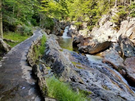 New Hampshire: Lost River Gorge and Boulder Caves - There's a lot to do at the Lost River Gorge and Boulder Caves, from yoga to lantern-lit tours and naturalist-led visits with wild animals. Open during the warmer months (May to October), visitors are not only treated to this natural wonder in the White Mountains, but it's also a chance to step on land that was carved out 300 million years ago. Have you ever visited this attraction?