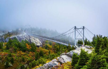 North Carolina: Mile High Swinging Bridge - This sky-high bridge in Grandfather Mountain State Park is tipped as the highest suspension footbridge in the country. A mile (1.6km) above sea level, it sways with the slightest gust. It provides the foreground to the park's namesake mountain – a near 6,000-foot (1,829m) peak. Have you ever visited this bridge?