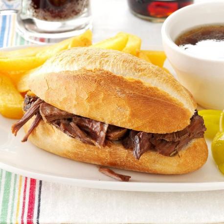 California — French dip sandwich - Two Los Angeles restaurants claim to have invented this favorite beef sandwich served with a bowl of au jus for dipping. Interestingly, they claim to have first served a sandwich with au jus with different motives: one to mask stale bread, and the other to help a customer with sensitive teeth. Regardless, I'm happy to eat a French dip like this today. Have you ever ate this food?