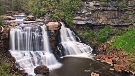 West Virginia: Blackwater Falls - Blackwater Falls owes its unique dark color to red spruce and hemlock needles that run into the water, a characteristic that has helped make this 60 feet tall fall one of the state's most beloved natural attractions. Hike around the falls or just stroll down to one of the handy observation decks for prime views of water flowing over the rocks. Have you ever been to this waterfall?